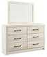 Cambeck King Upholstered Panel Bed with Mirrored Dresser, Chest and Nightstand